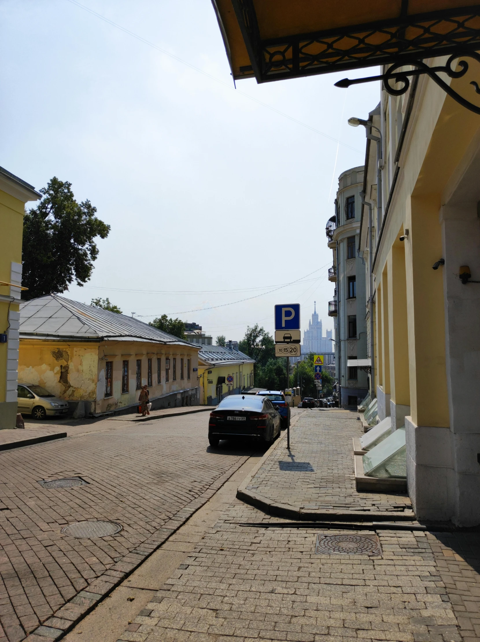 there is a small car parked on the street