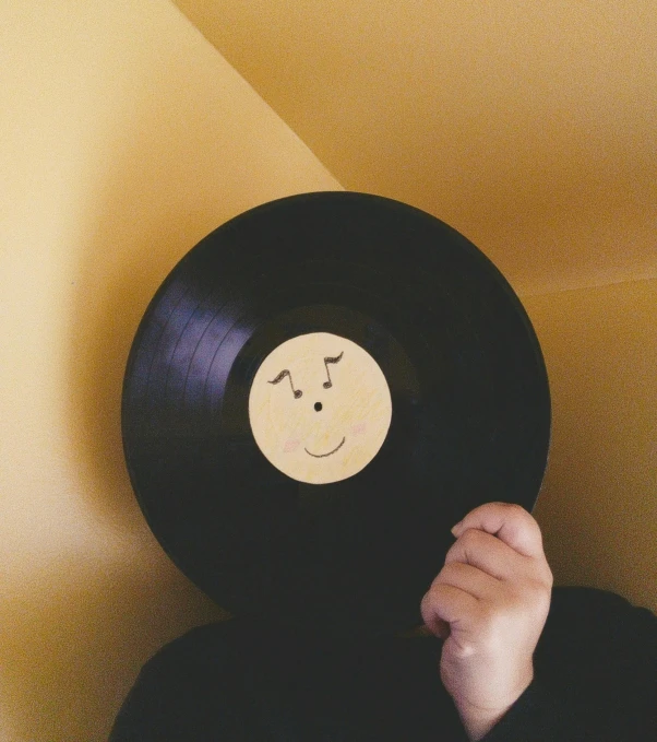 a person's face on the inside of a vinyl record