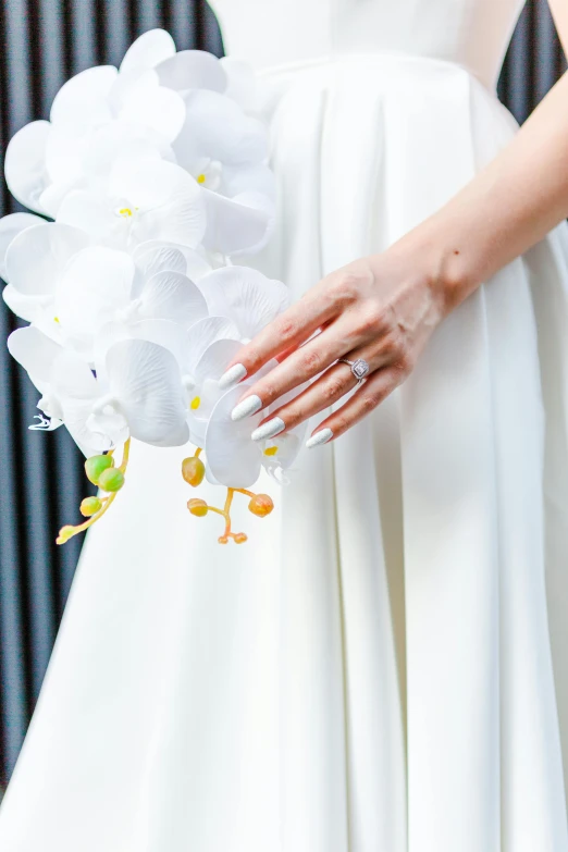 a close up of a person with a bouquet of flowers