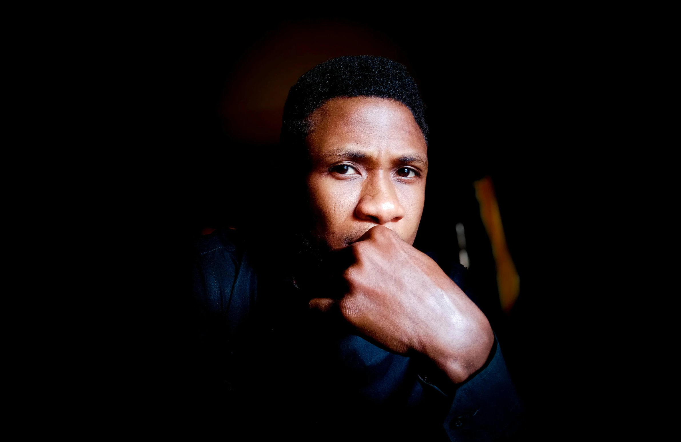 a close up s of a man with black hair