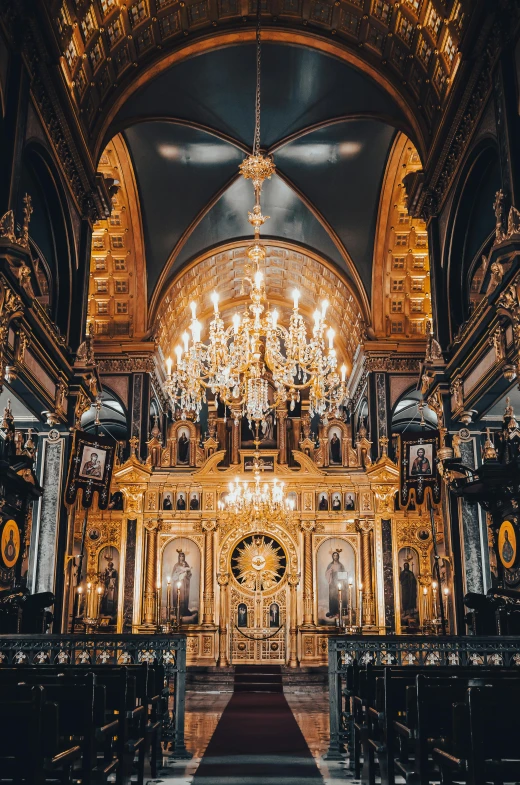 a beautiful church with the chandelier and decorations