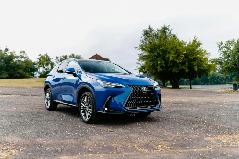 the new toyota kona is parked on a gravel lot