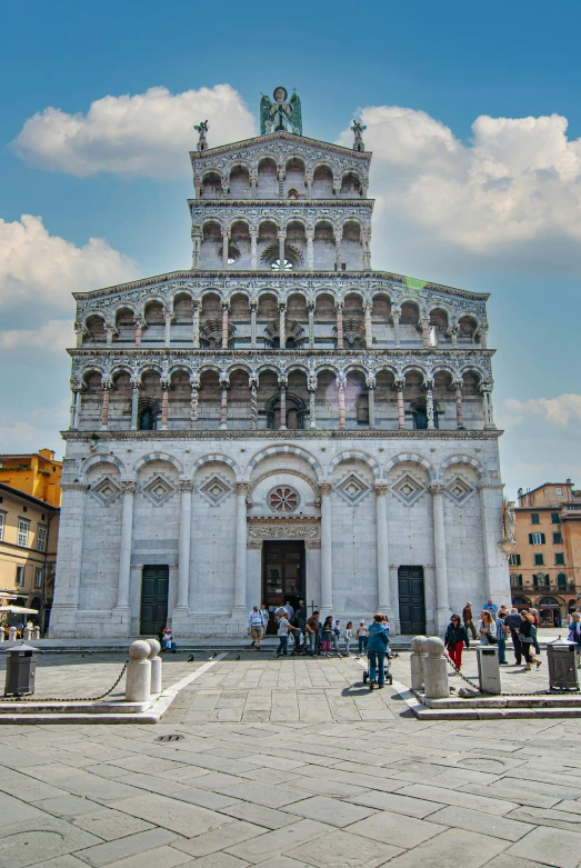 a white building with an intricately decorated front