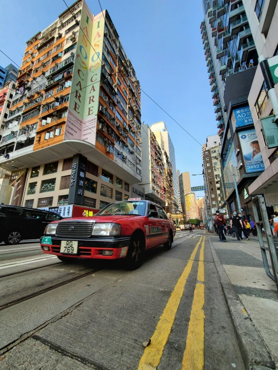 cars going down an otherwise quiet city street