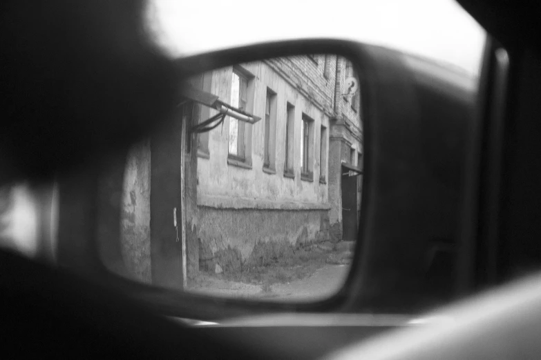 a person in a car looking out the window