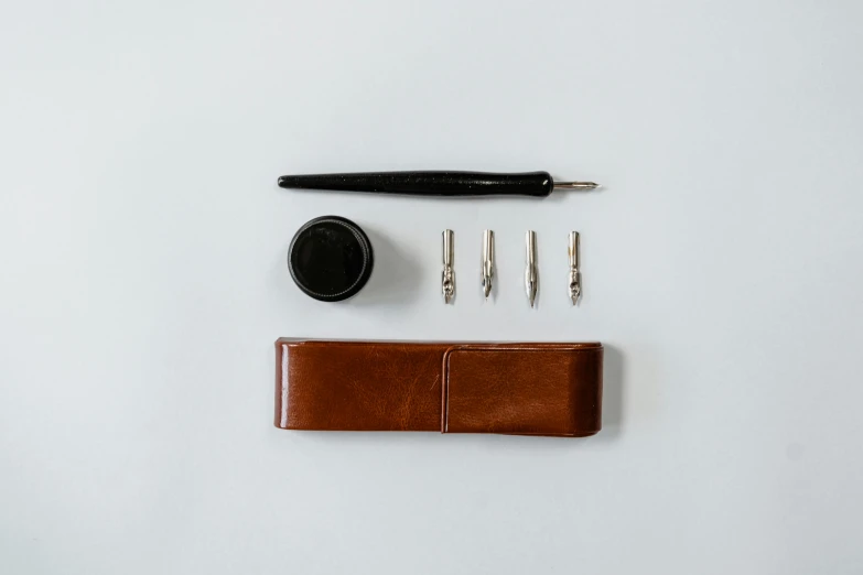 scissors and an empty wallet on a white table