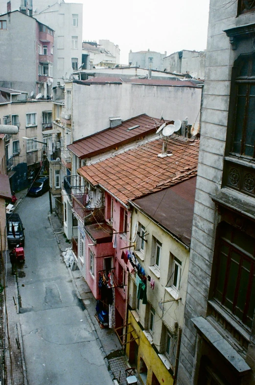 an aerial view of a city street with many tall buildings