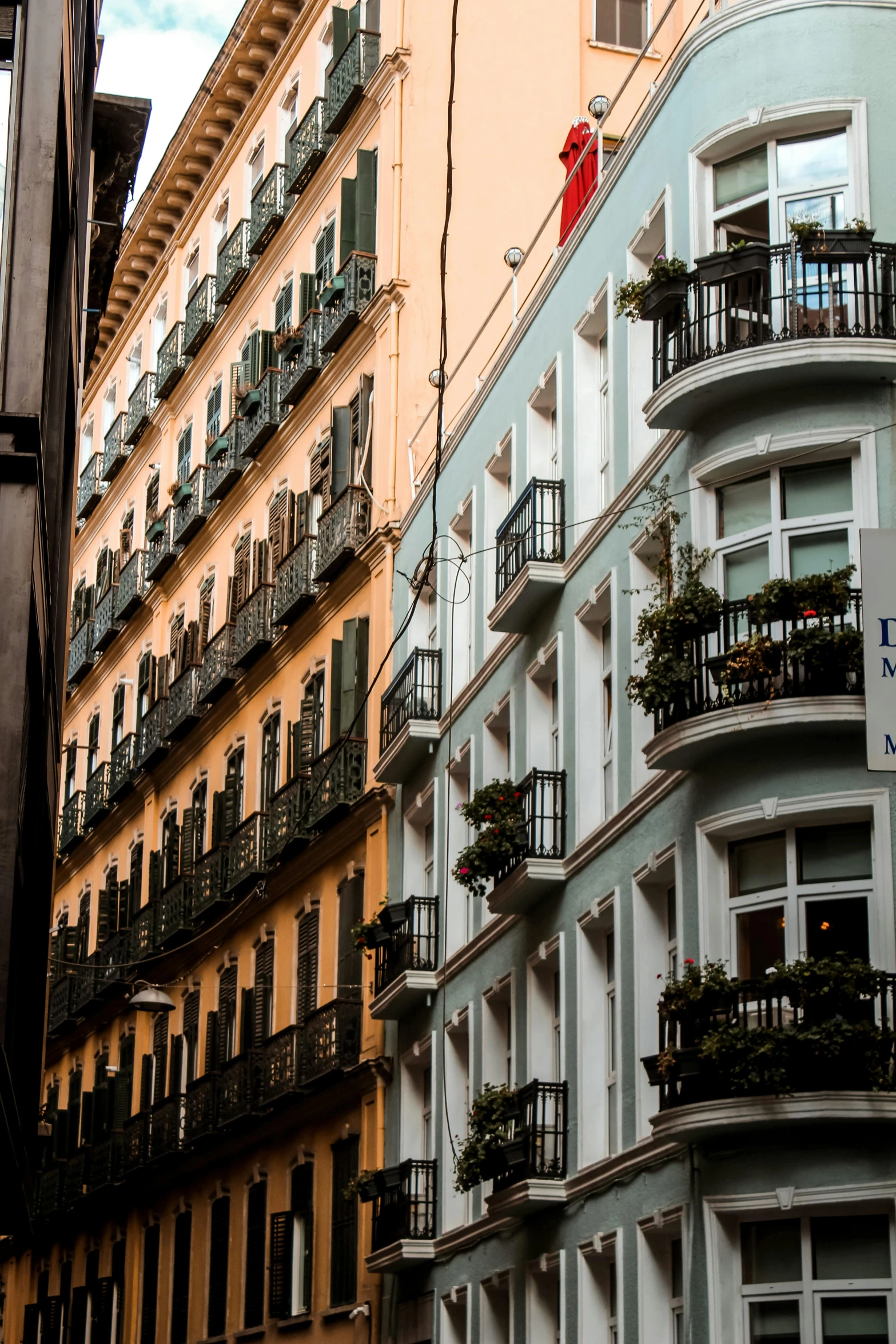 a city has many windows and balcony balconies