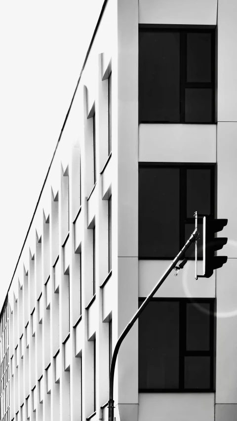 a black and white po shows a tall building