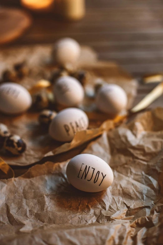 an easter arrangement with a dozen eggs, and an egg spoon