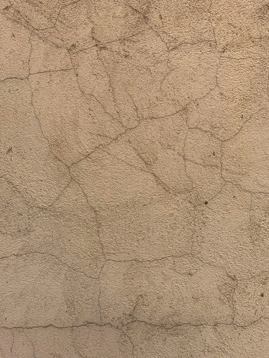 a close up image of a sidewalk and concrete