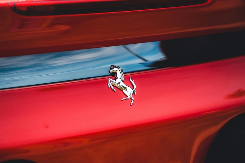 the hood ornament on a car's grille