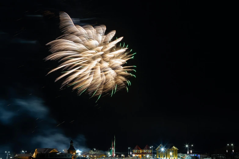 there are fireworks in the sky above the city