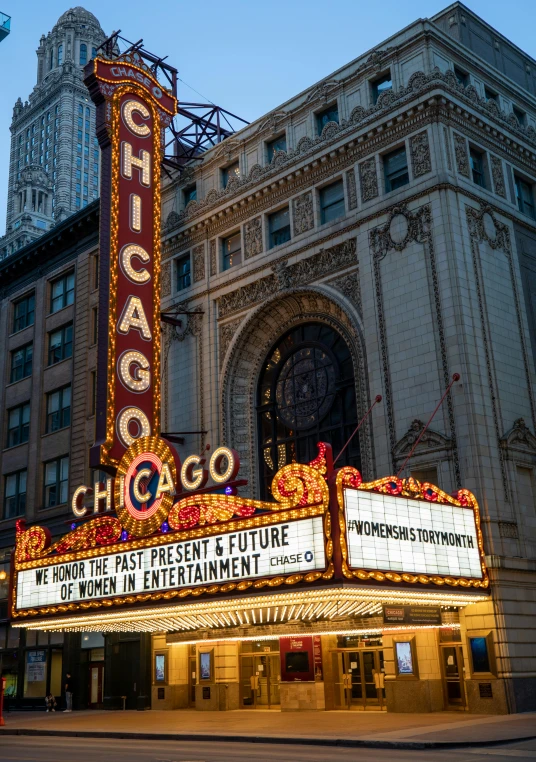 the chicago theatre on broadway has a large marquee on it