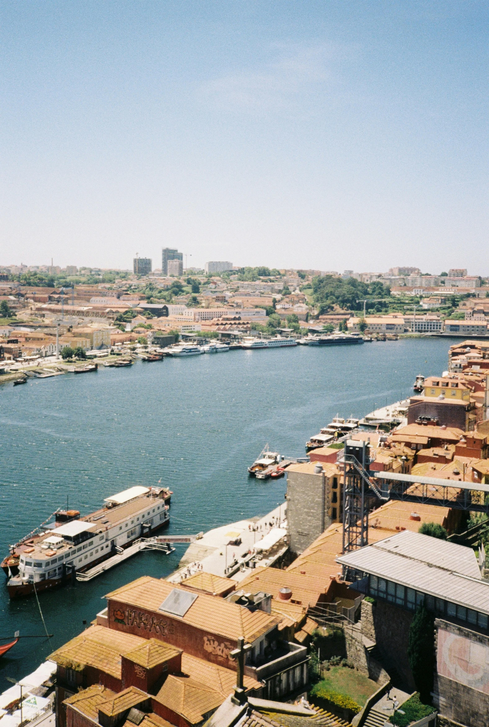 some boats floating on top of a body of water