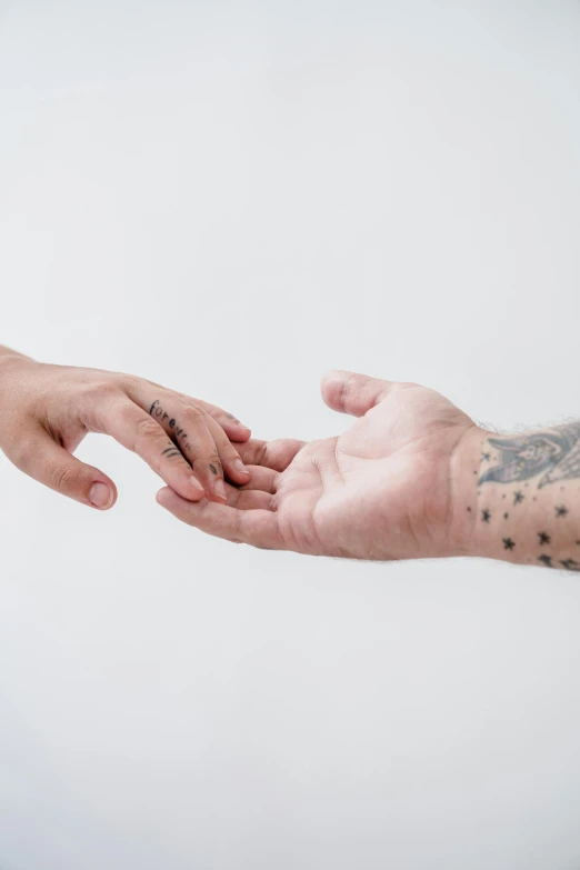 an image of two people in the same hand