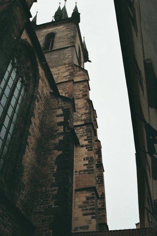 an old tower with lots of windows against the sky