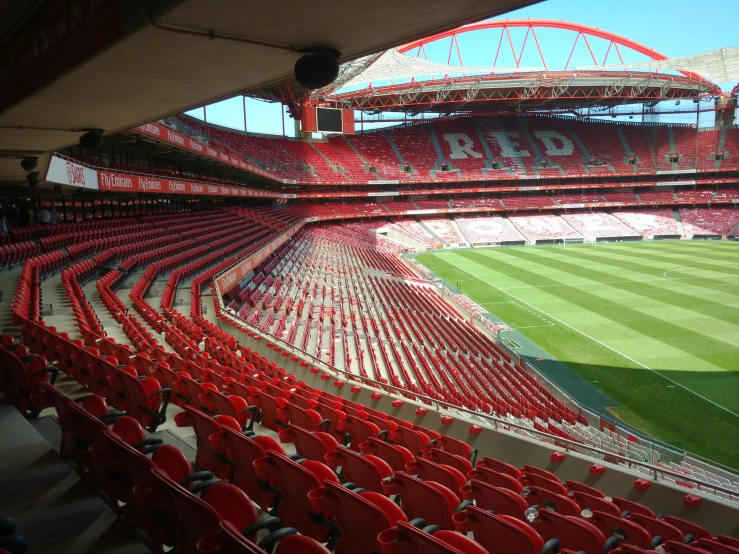 a stadium full of chairs that are empty