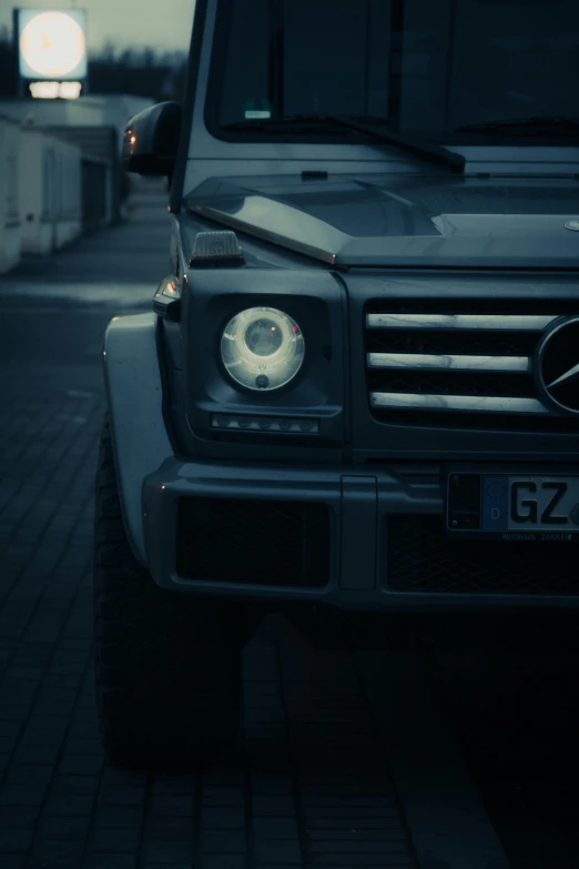 there is a black car parked on a street