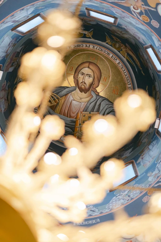 the view through the lens of a bowl with a cross