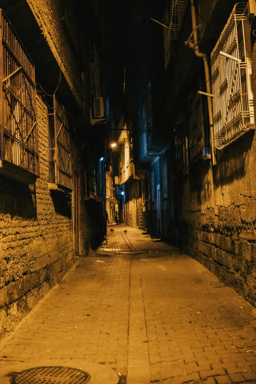 alley way in dark with no people inside at night