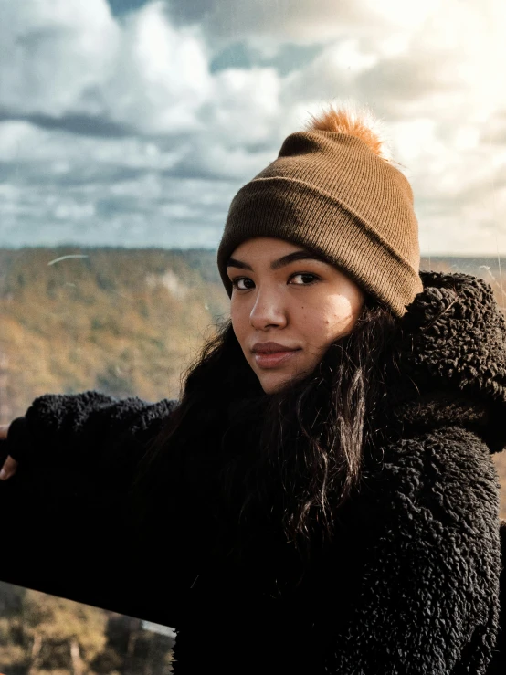 woman in winter clothing with hat and scarf