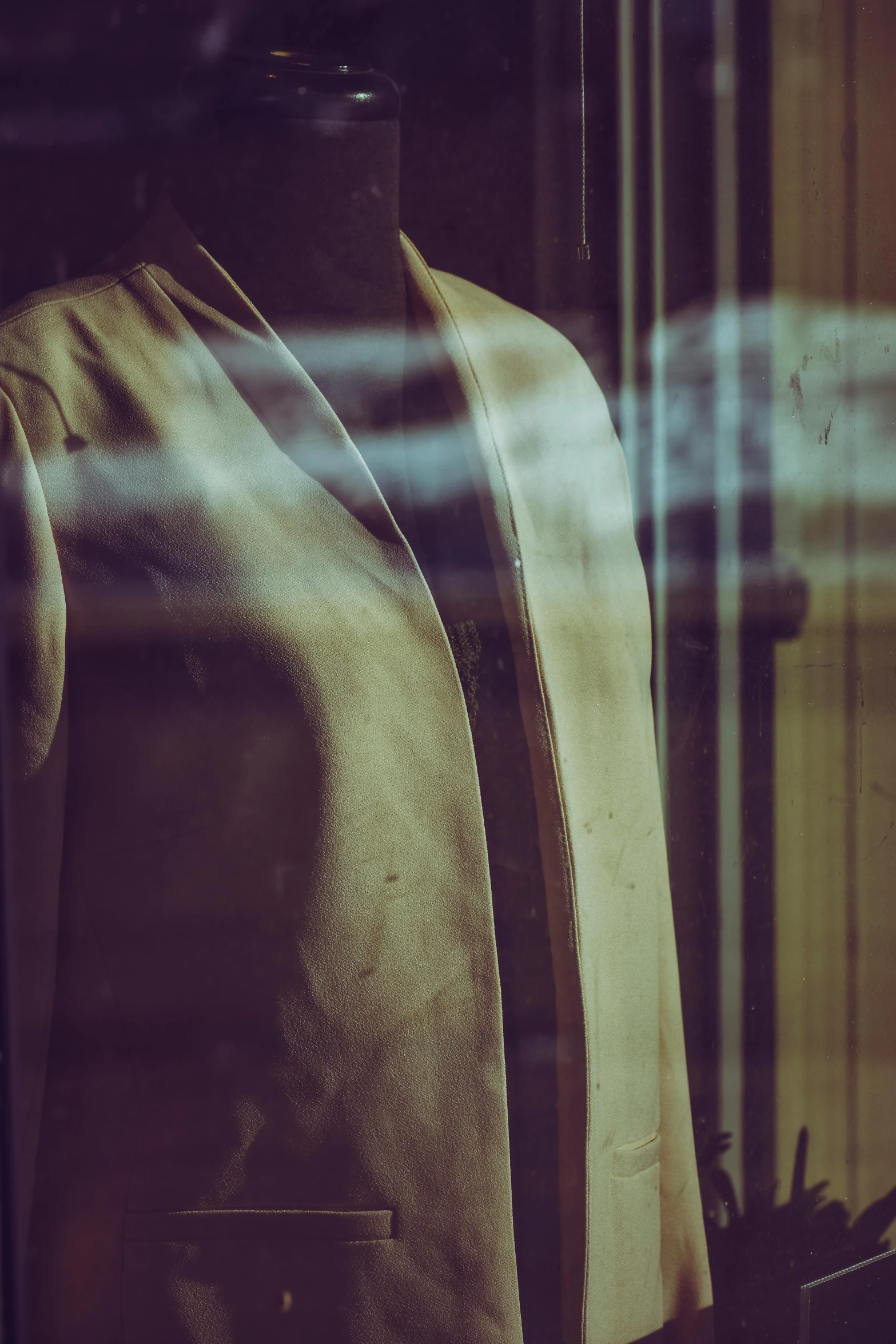 a suit and tie that is on display