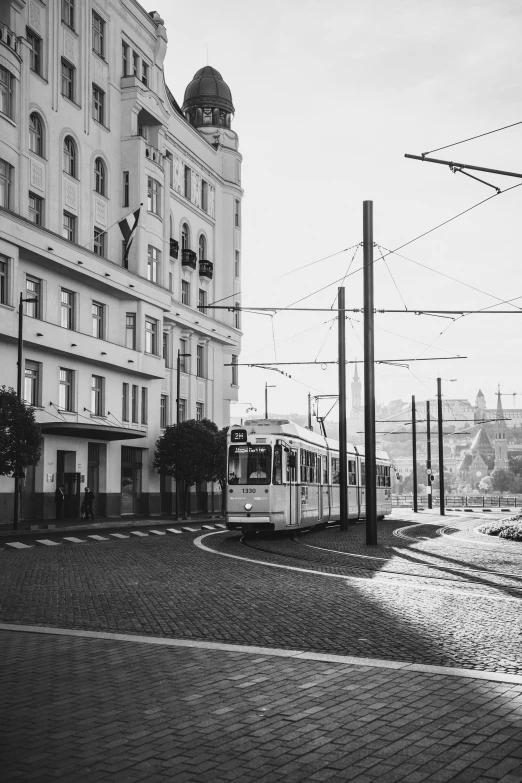 a large long train on a city street