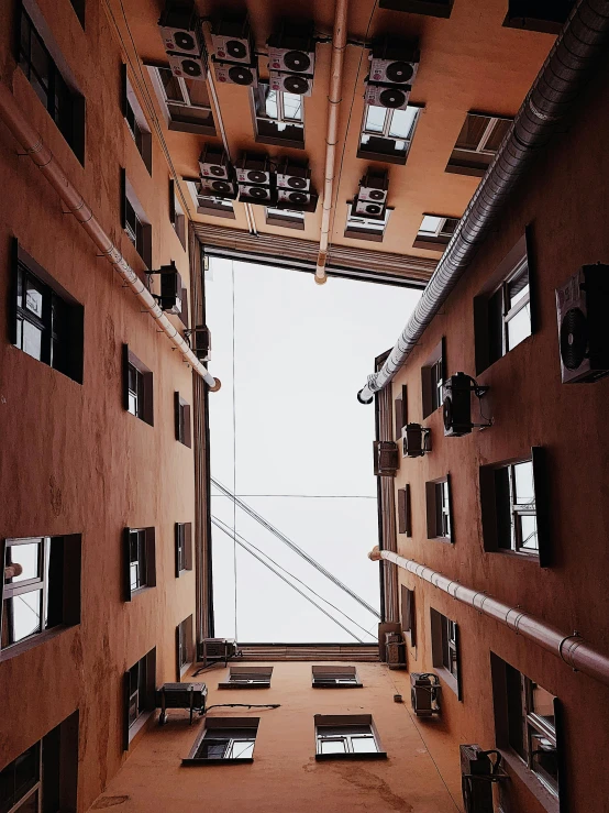 an image of looking up from inside a building