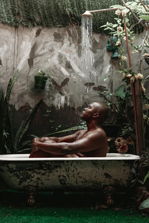 an old fashioned bath tub filled with a spoutsing water