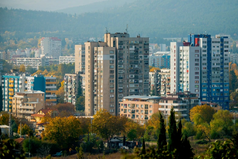 an aerial view of city buildings in a valley