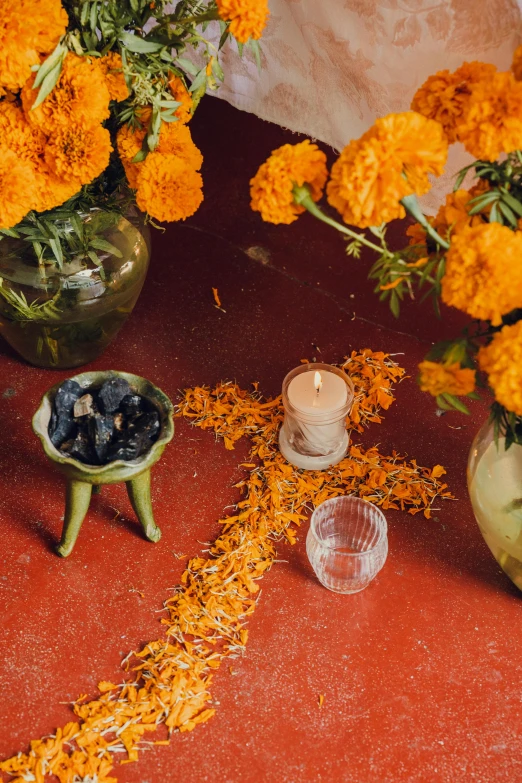 a table topped with a lot of different types of flowers