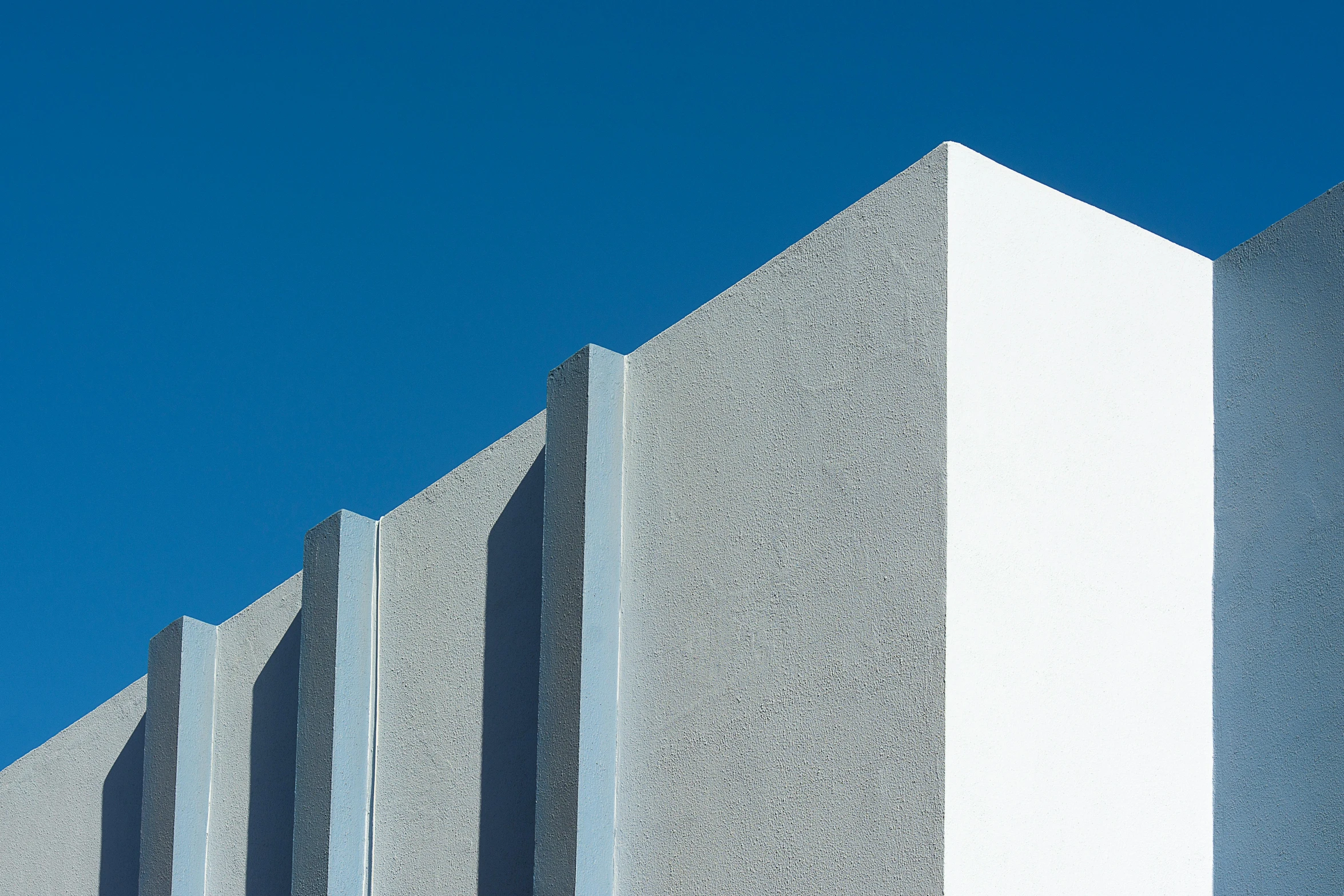 this is a very tall block next to a building