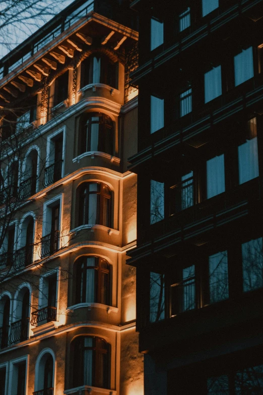 the building has many windows lit up