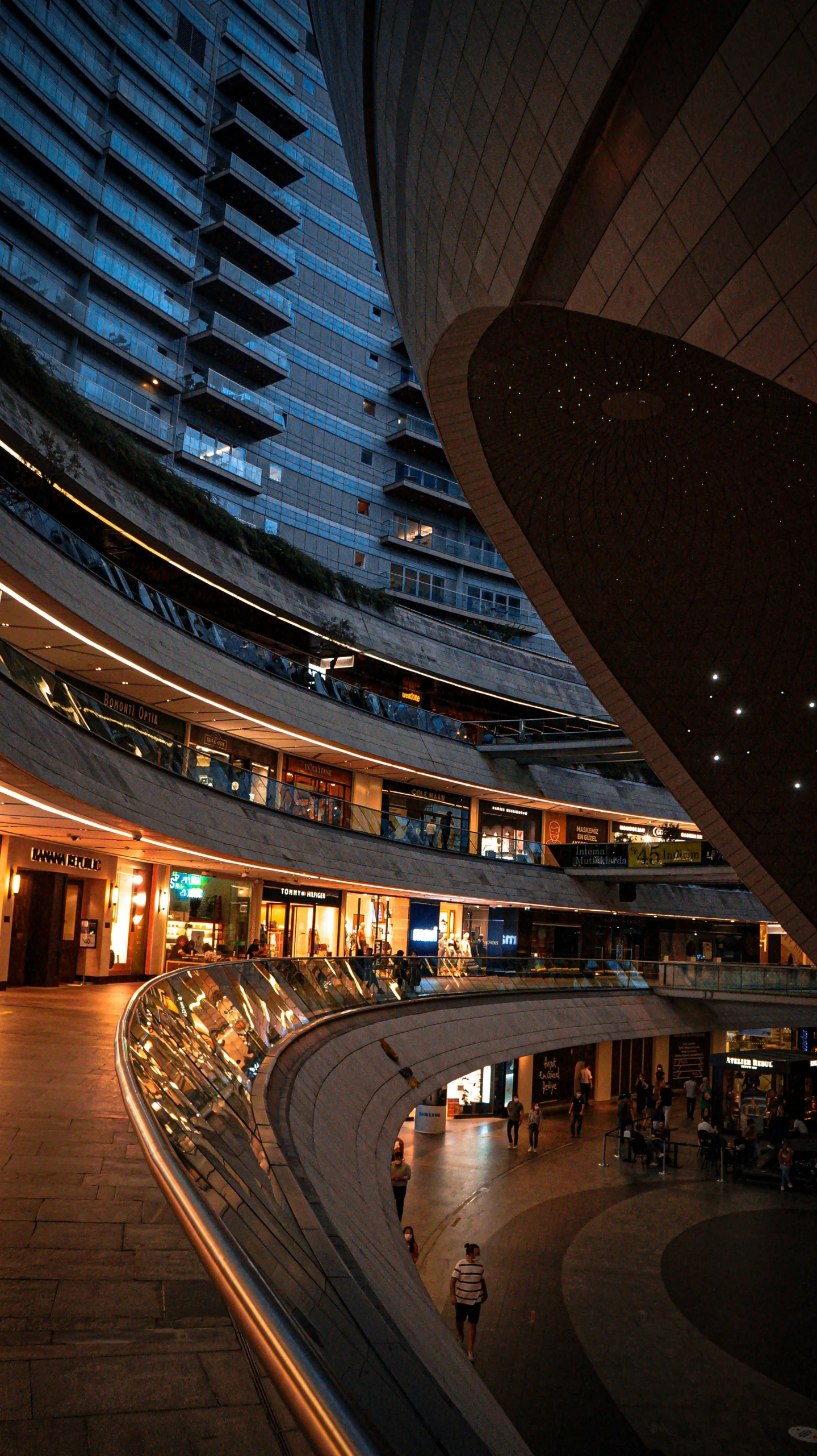 a round building with multiple stairs and arches