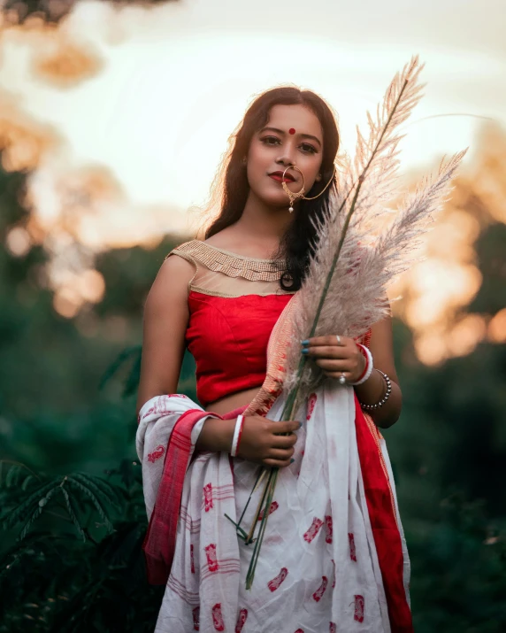 a woman with some feathers around her body