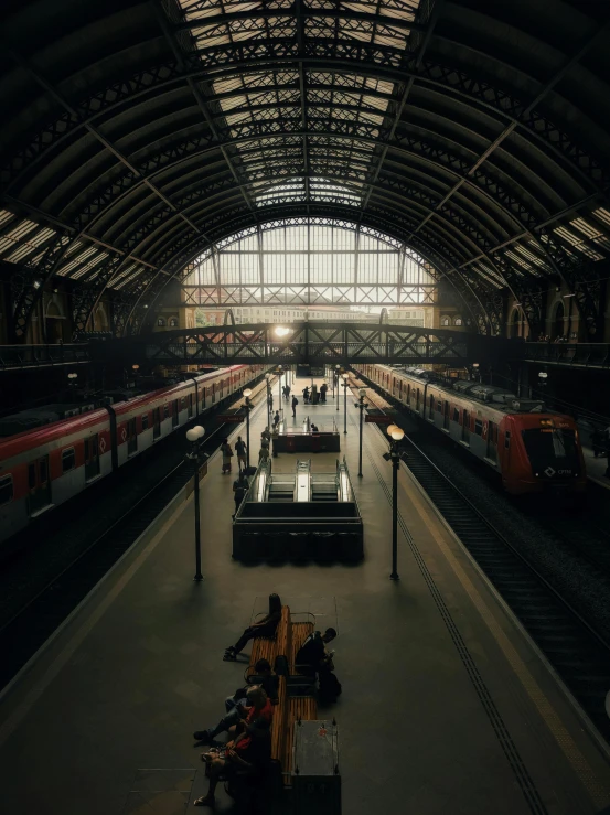 several trains that are sitting in a station