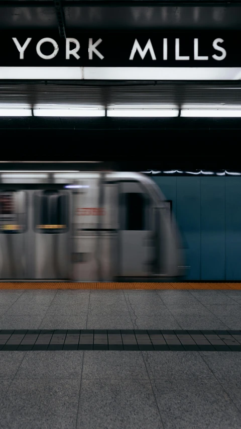 the subway station is empty and it is very bright