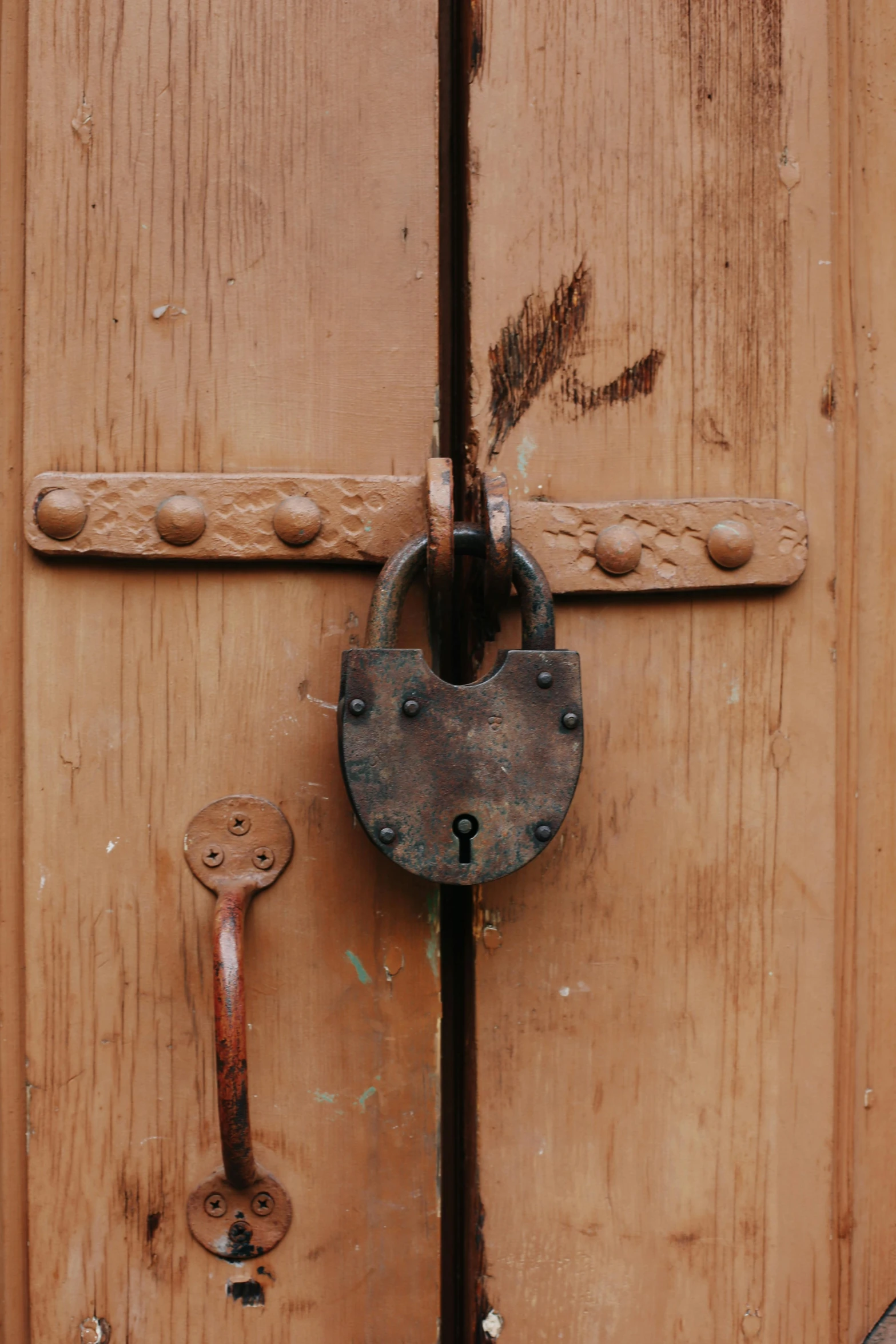 a lock and a door with two keys