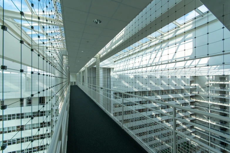 the inside of an office building with a long corridor