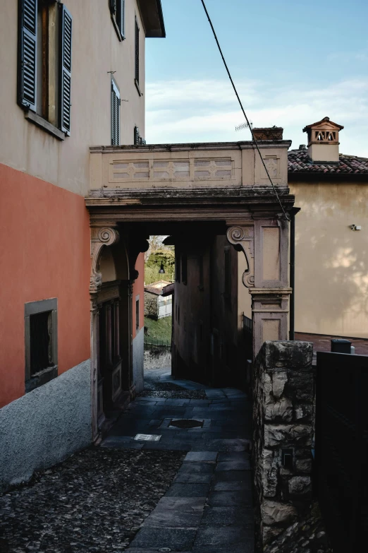 an entrance way between buildings on both sides