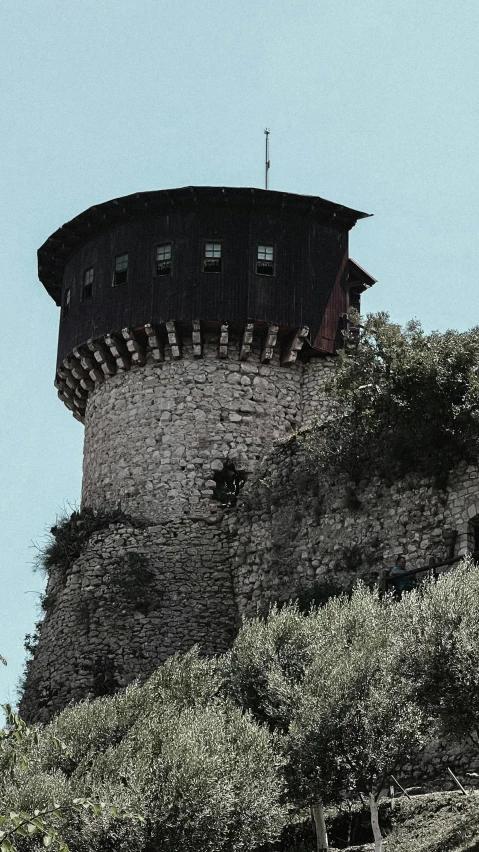 a black and white po of a stone tower