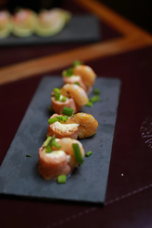 a row of food items sits on top of a plate