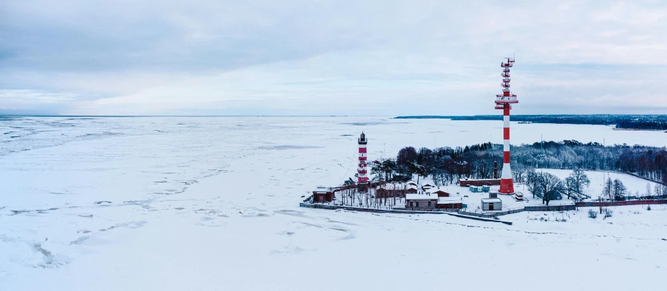 an aerial view of a radio station on the lake