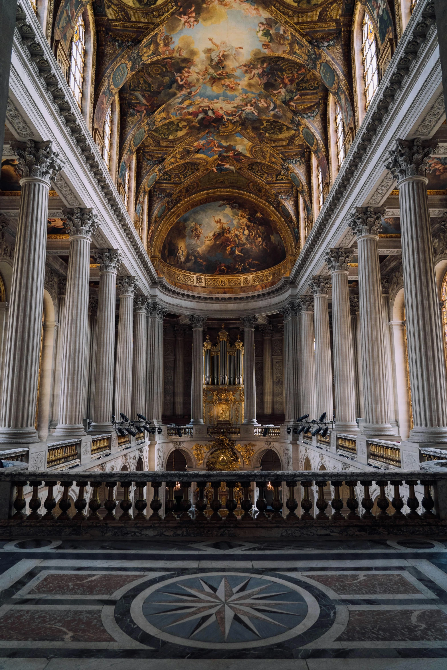 there is a massive painting in the ceiling of this church