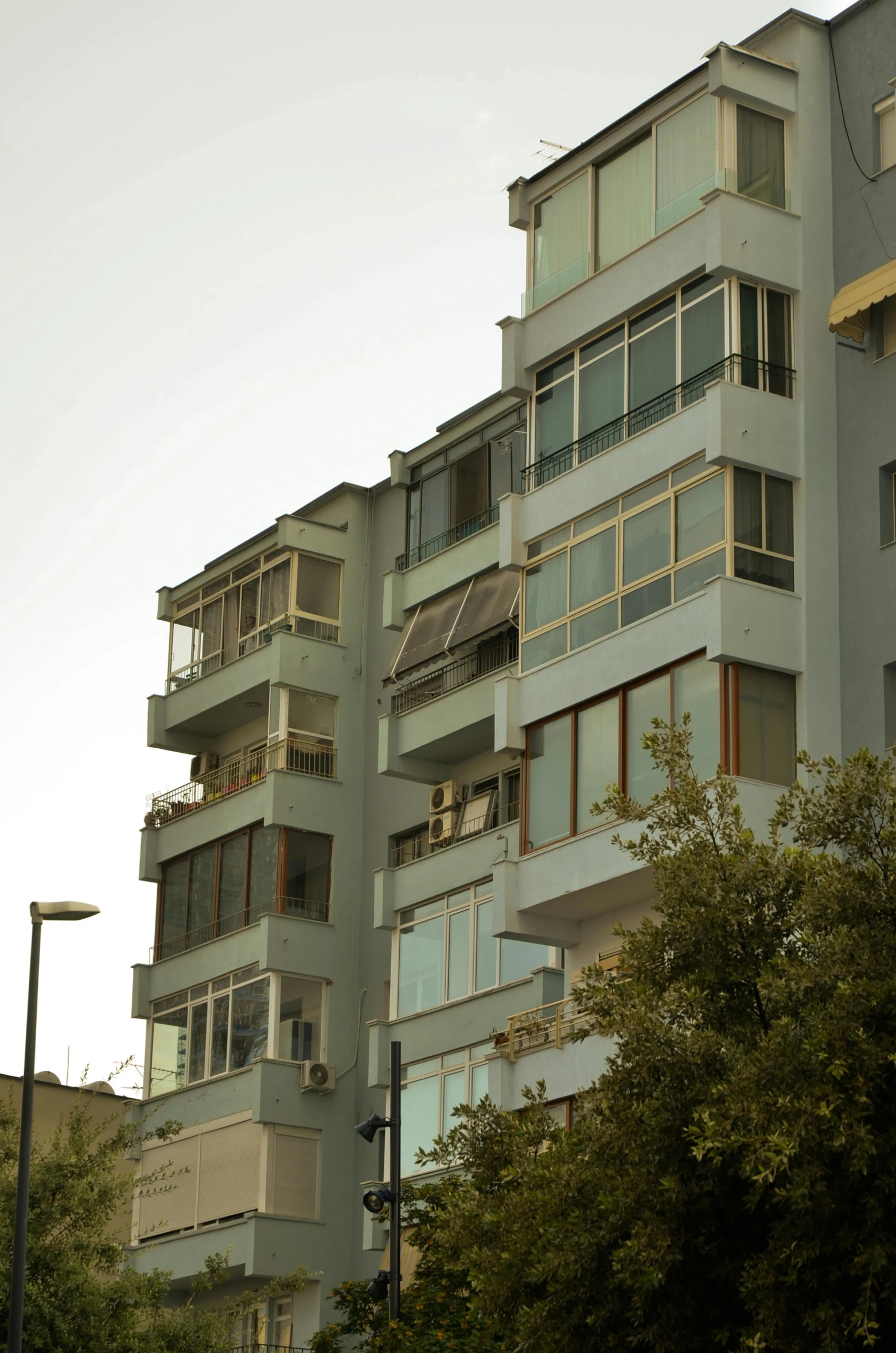 the apartment buildings are made of concrete