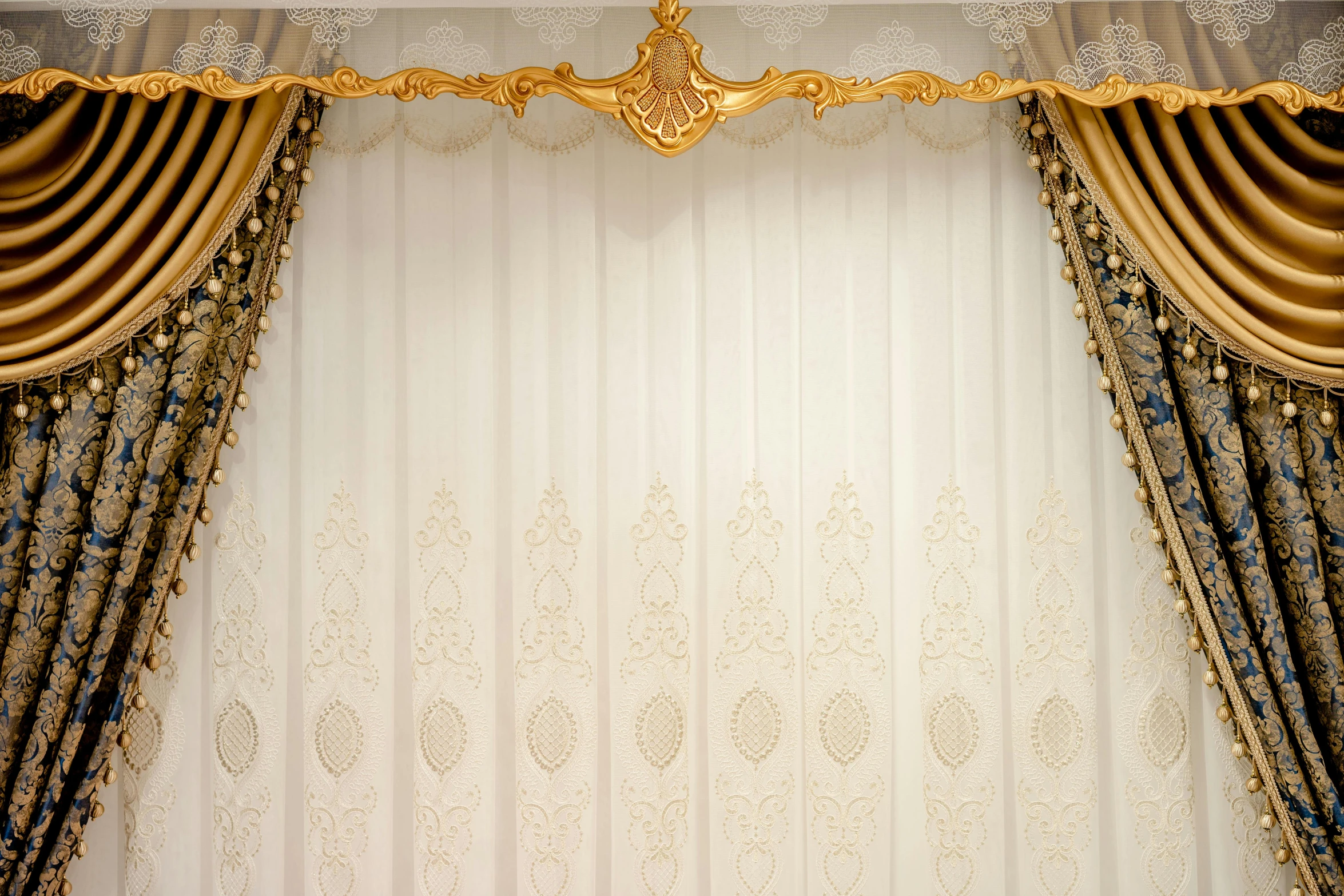 the gold dries are covered by sheer curtains