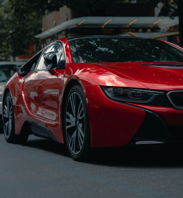 red cars are lined up on the street