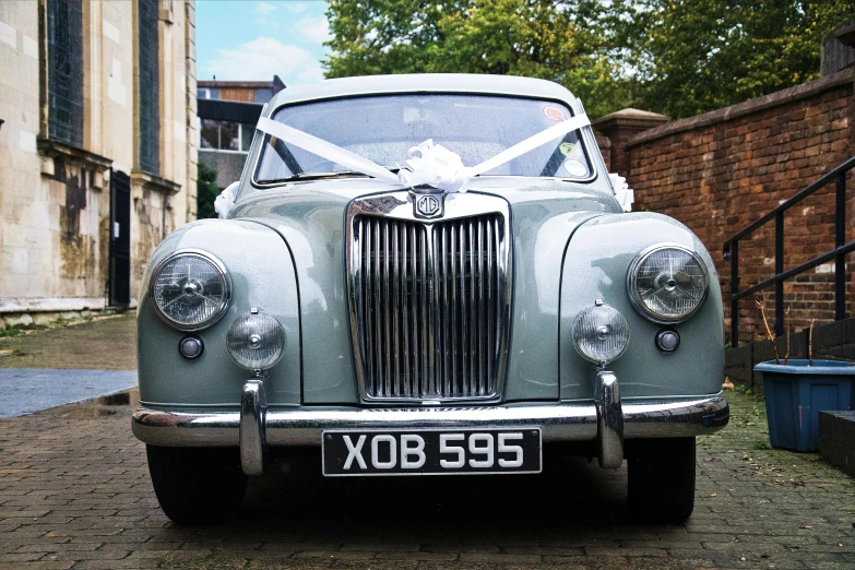 the front of an old wedding car