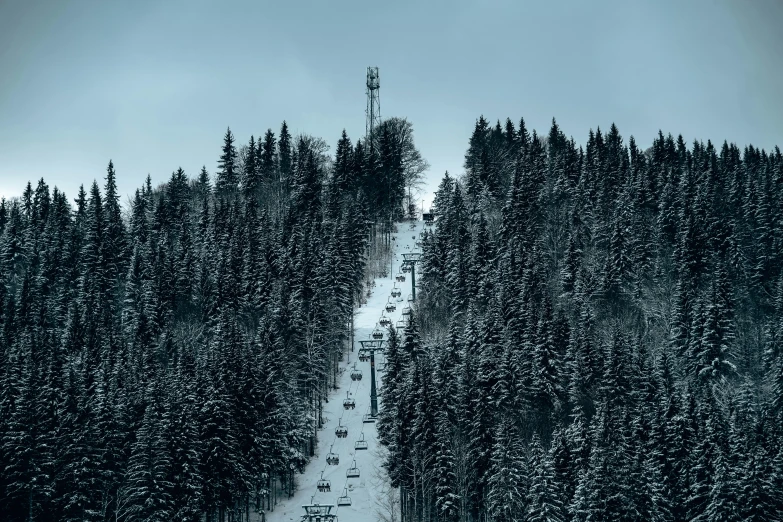 ski lift at the bottom of a slope